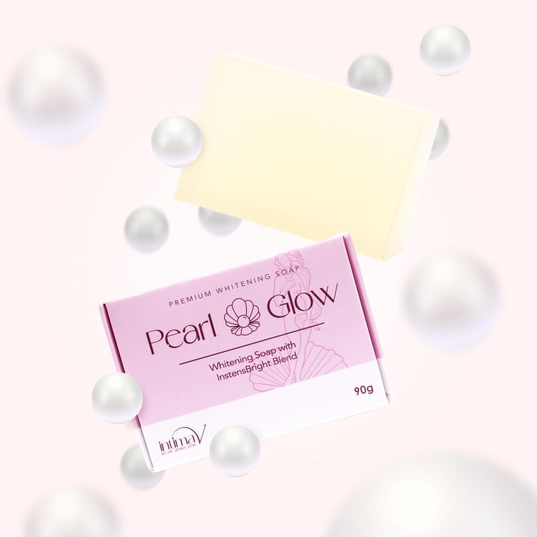 Pearl Glow whitening soap bar floating beside its pink box among pearls